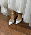 Весільні туфлі з бантами та камінцями