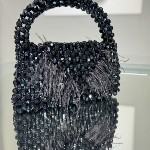 Святковий клатч з бусинами та пір'ям