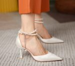 Весільні туфлі для нареченої з перлами