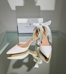 Весільні шкіряні туфлі з бантами та перлами