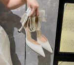 Весільні шкіряні туфлі з бантами та перлами