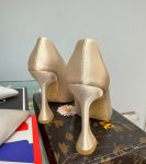 Святкові туфлі бежевого кольору з брошкою та камінням