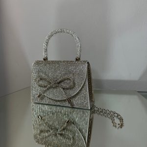 Святковий клатч з камінцями та бантом
