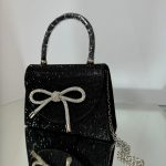 Святковий чорний клатч з камінцями та бантом