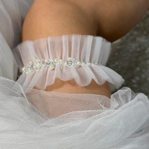 Весільна підв'язка з перлами