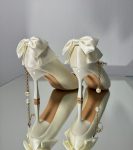 Весільні туфлі для нареченої з бантами на п'ятці + ремінець перли