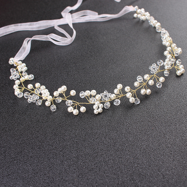 Прикраси для волосся весільні